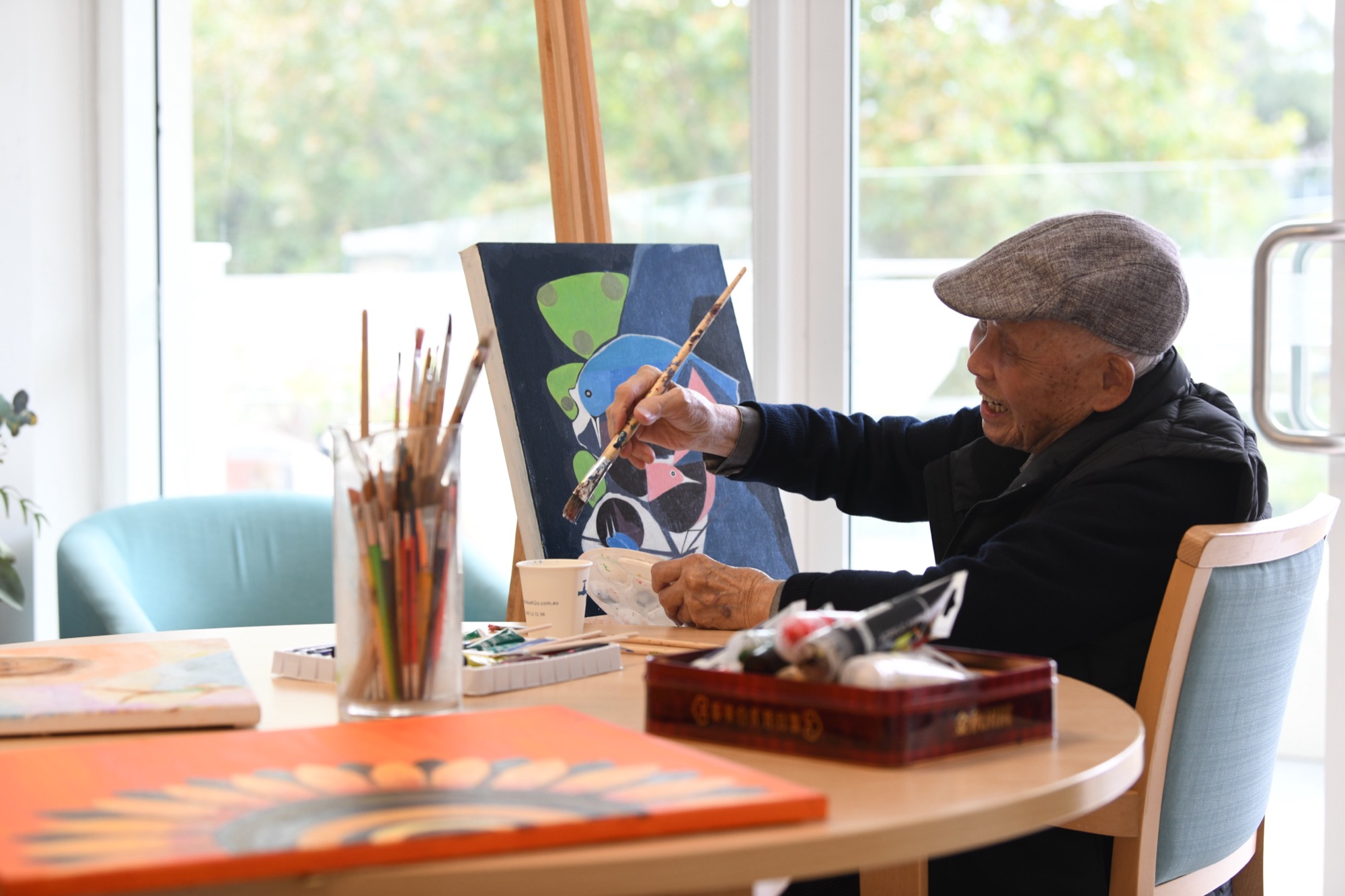 Resident engaging in community activities at Dougherty Apartments